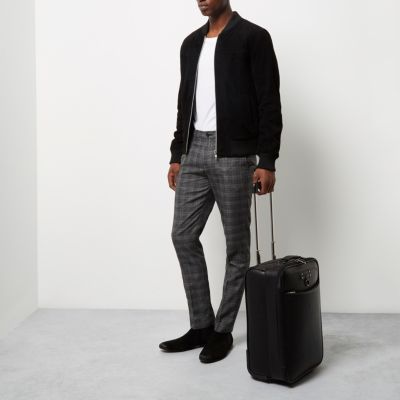 Black perforated leather look suitcase